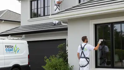 Professional trim and fascia painting on a home exterior in Saint Charles, MO
